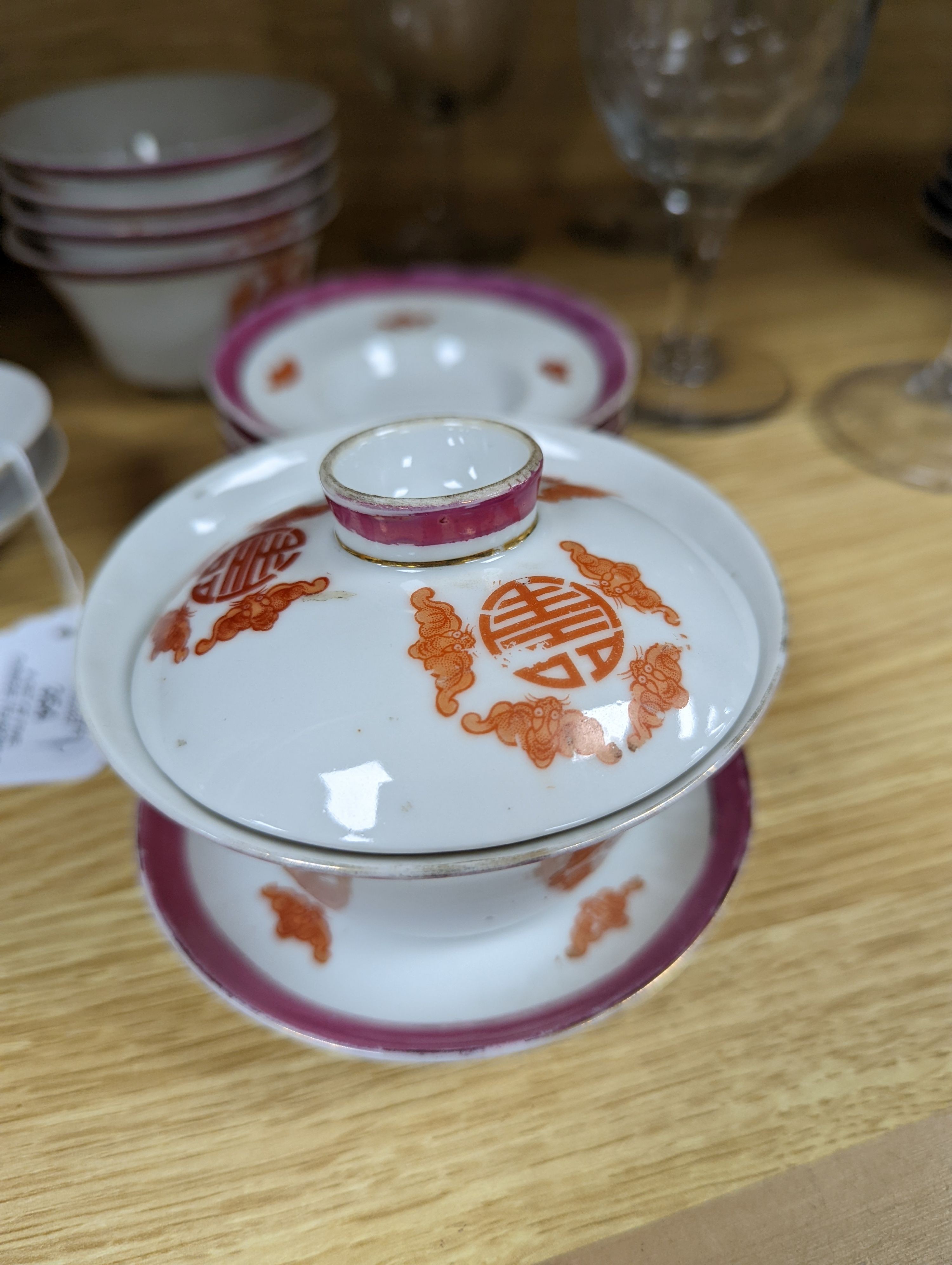 A set of five Chinese teabowls, covers and stands and a similar 'dragon' vase, 23cm